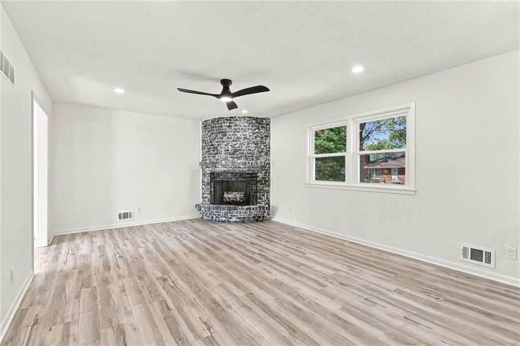Fireplace and brick fireplace at 8915 E 57TH Street, Raytown, MO 64133