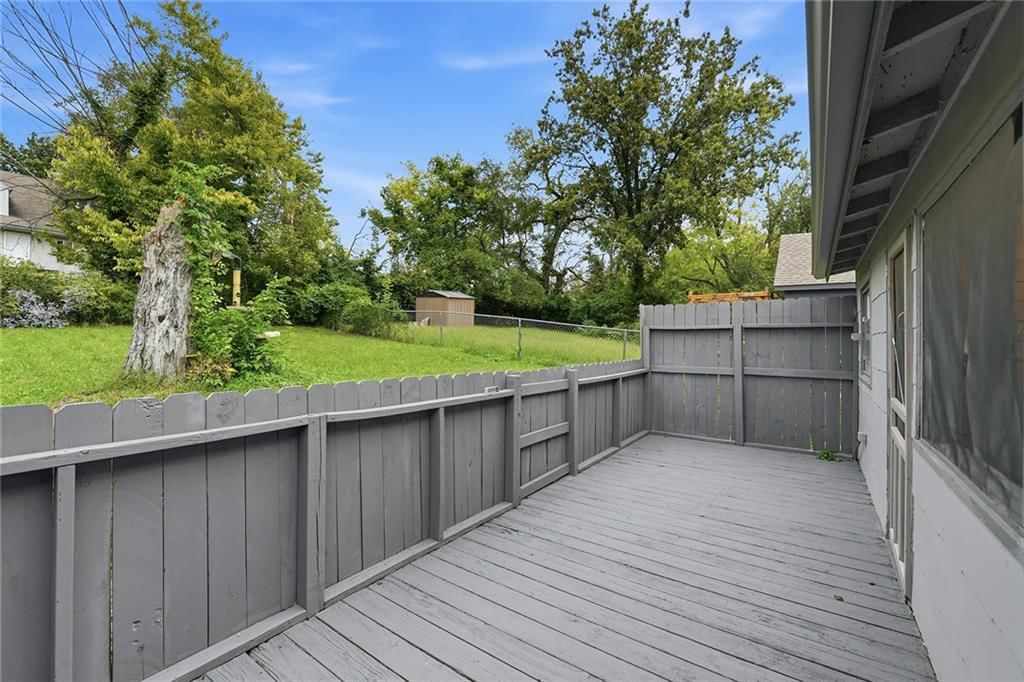 Deck and fenced yard at 124 S Myrtle Street, Excelsior Springs, MO 64024