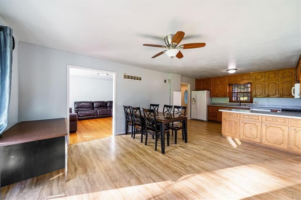 Fireplace and open floor plan at 2611 N 83rd Street, Kansas City, KS 66109