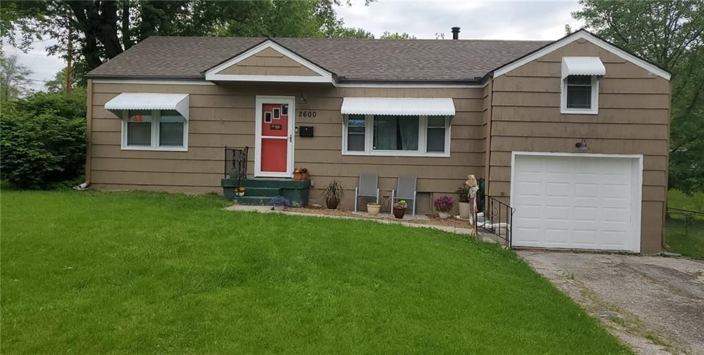 Mature trees and attached garage at 2600 N 45 Street, Kansas City, KS 66104