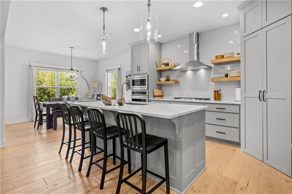 Photo 13: painted kitchen cabinets, 2602 SW River Trail Road, Lee's Summit, MO 64082