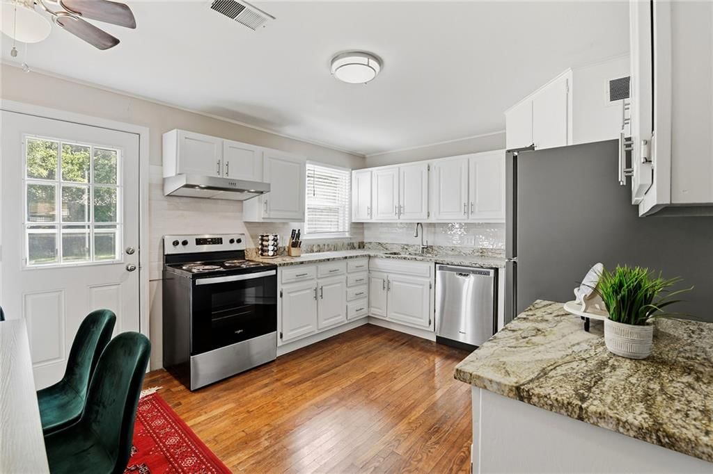 Photo 7: white kitchen cabinets, 7621 Conser Street, Overland Park, KS 66204