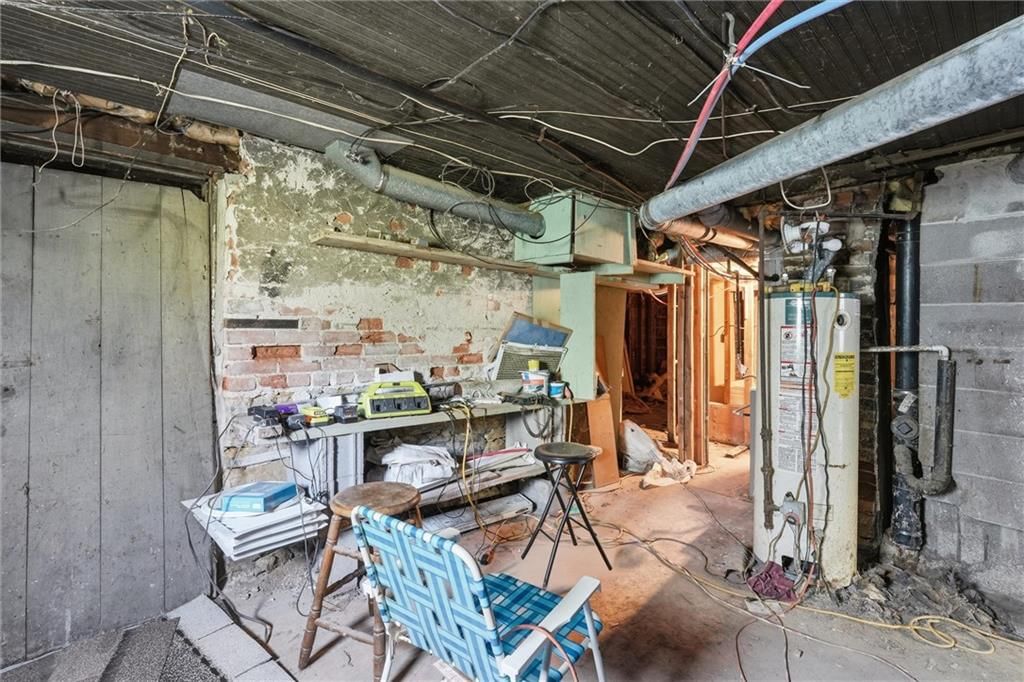 Exposed brick wall and staircase at 838 Ottawa Street, Leavenworth, KS 66048
