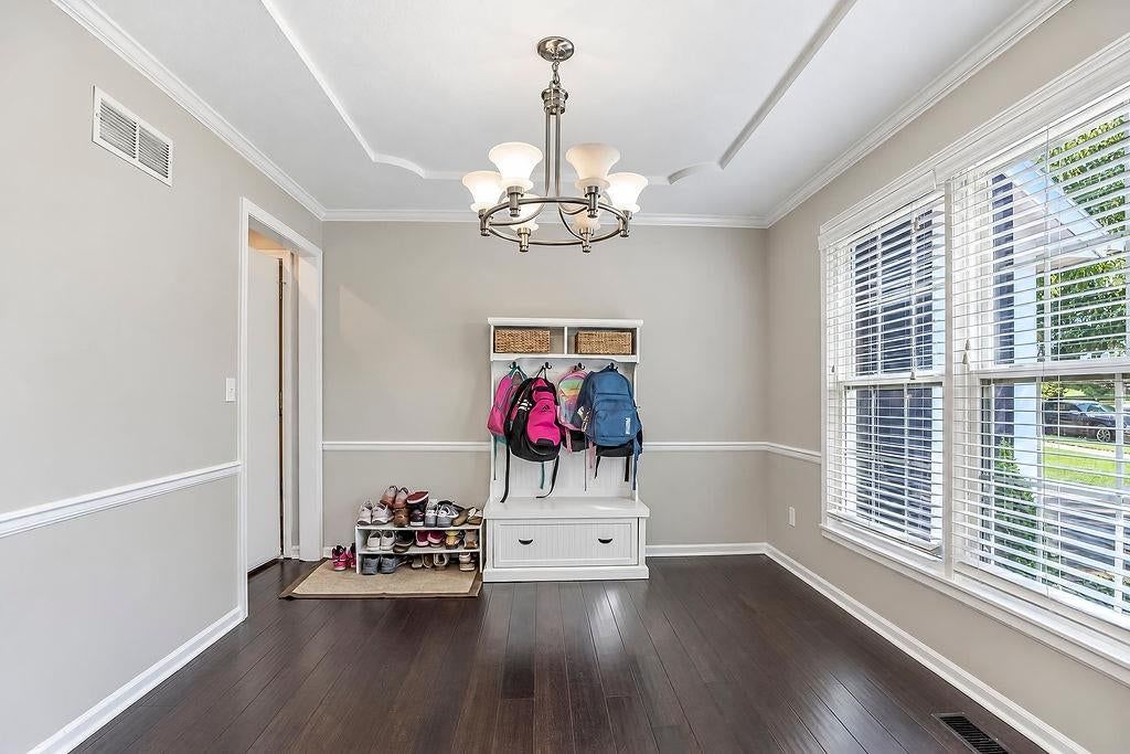 Home office, statement lighting and home gym at 16110 W 82nd Place, Lenexa, KS 66219