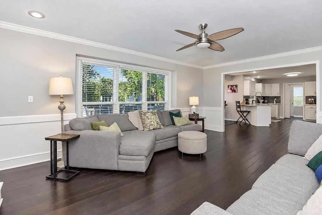 Open floor plan and wall of windows at 16110 W 82nd Place, Lenexa, KS 66219