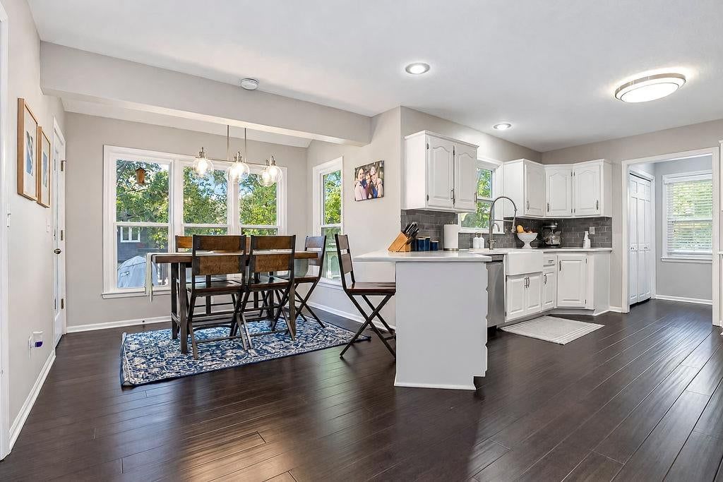 Kitchen island, breakfast nook and recessed lighting at 16110 W 82nd Place, Lenexa, KS 66219