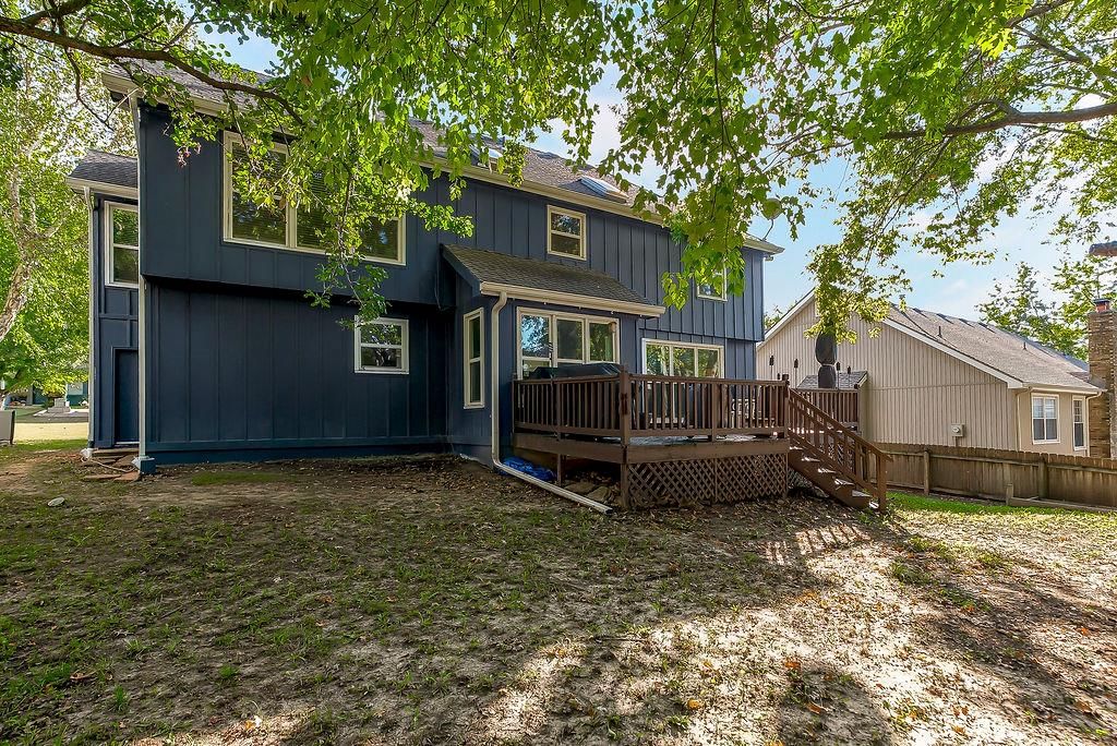 Deck, fenced yard and wood fence at 16110 W 82nd Place, Lenexa, KS 66219