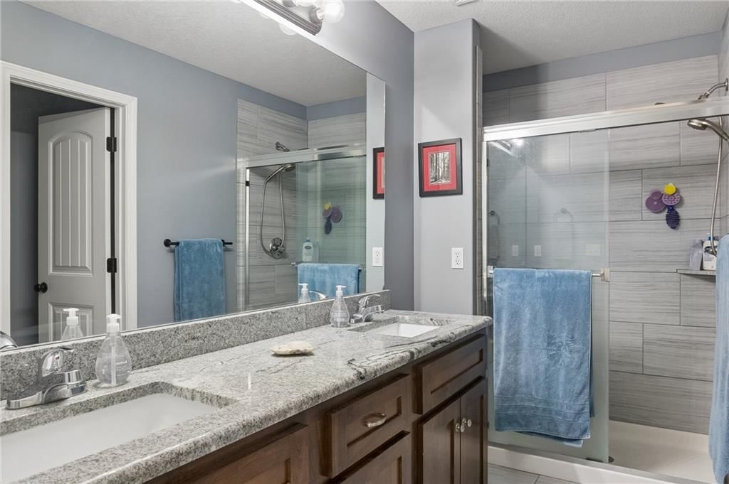 Photo 15: frameless glass shower, 3517 NE 85th Terrace, Kansas City, MO 64156