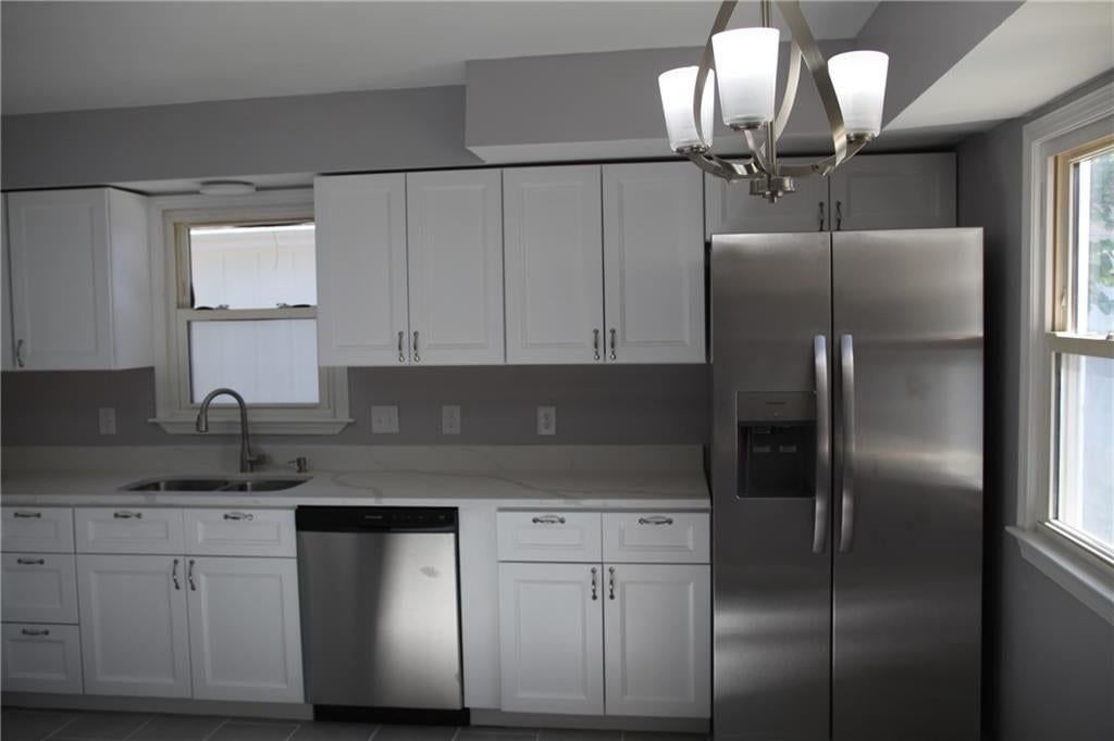 Photo 8: white kitchen cabinets, 1101 SW 21st Street, Blue Springs, MO 64015