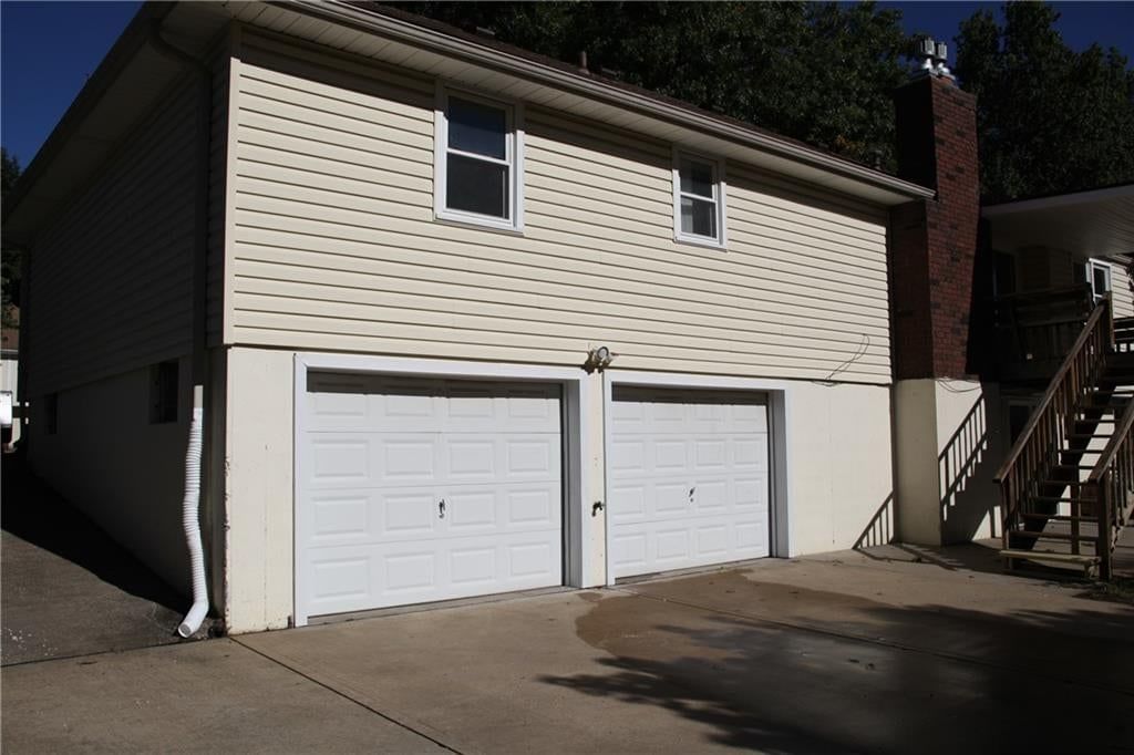 Attached garage at 1101 SW 21st Street, Blue Springs, MO 64015
