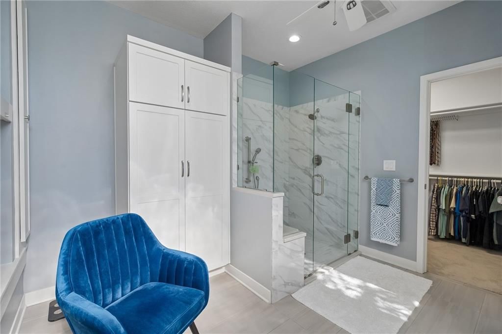 Walk-in shower, tiled shower and frameless glass shower at 20405 W 98th Court, Lenexa, KS 66220