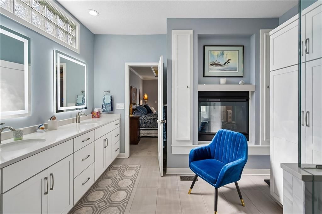 Double vanity, white vanity and renovated bathrooms at 20405 W 98th Court, Lenexa, KS 66220