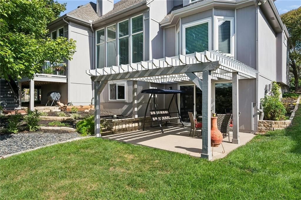 Pergola, covered patio and concrete patio at 20405 W 98th Court, Lenexa, KS 66220