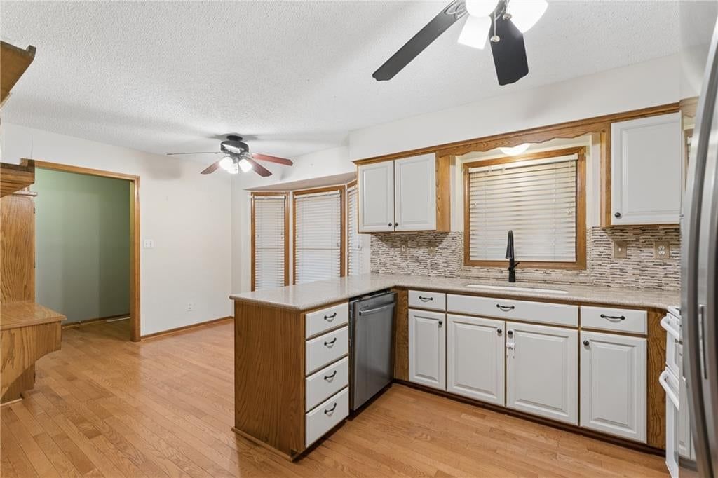 Photo 6 of 48 - 617 W Maple Street, Raymore, MO 64083