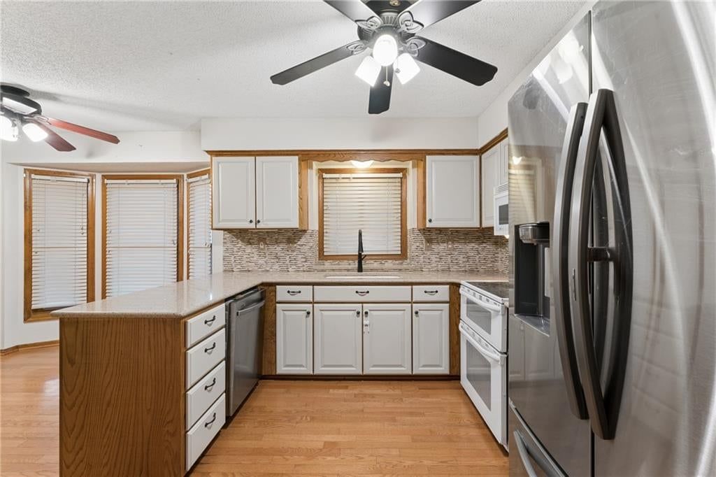 Photo 7 of 48 - 617 W Maple Street, Raymore, MO 64083