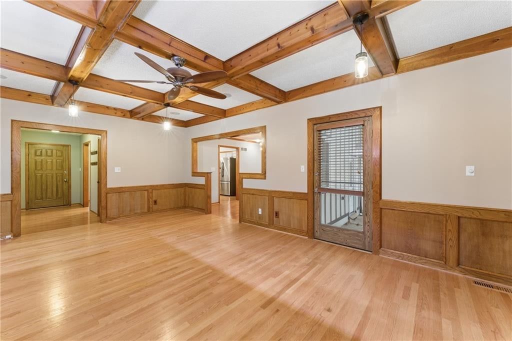 Fireplace and statement lighting at 617 W Maple Street, Raymore, MO 64083