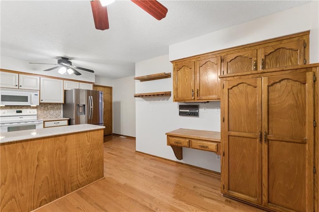Photo 12 of 48 - 617 W Maple Street, Raymore, MO 64083