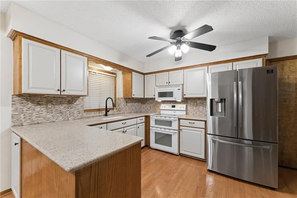 Photo 37 of 48 - 617 W Maple Street, Raymore, MO 64083