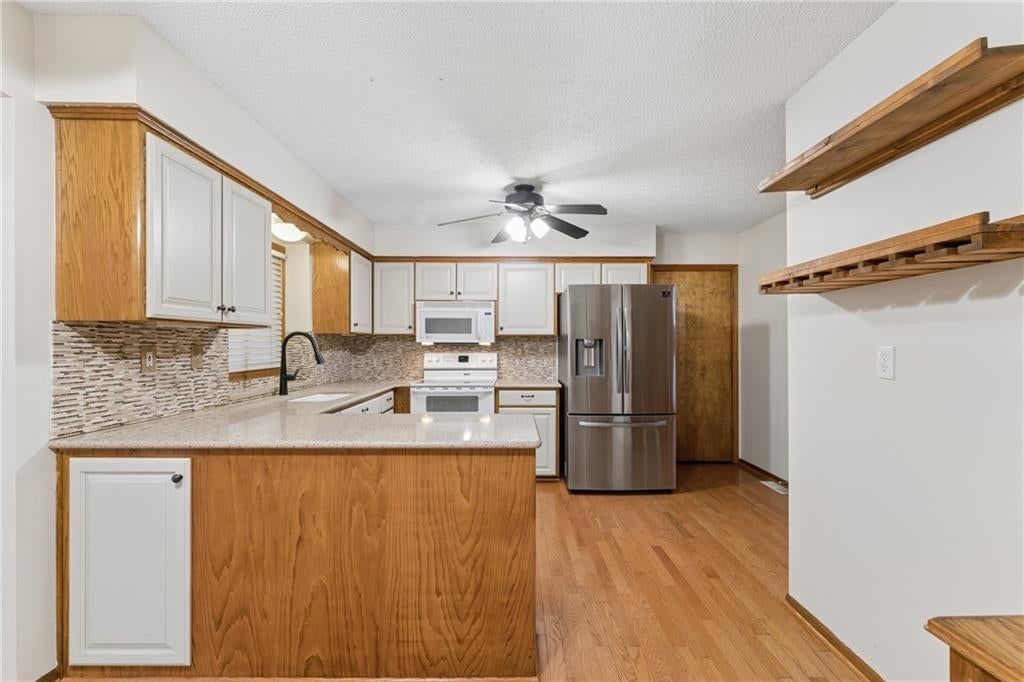 Photo 42 of 48 - 617 W Maple Street, Raymore, MO 64083