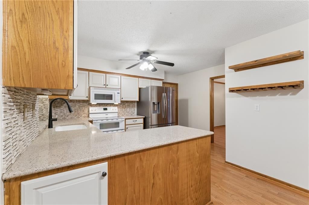 Photo 45 of 48 - 617 W Maple Street, Raymore, MO 64083
