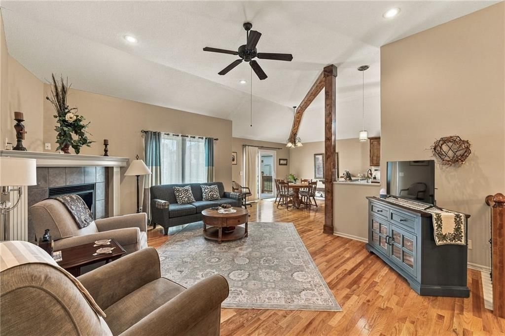 Tall ceilings, fireplace and open floor plan at 343 SE WOOD Lane, Lee's Summit, MO 64063