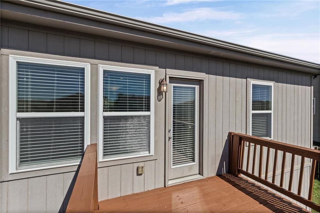 Deck, big backyard and fenced yard at 26169 W 141st Terrace, Olathe, KS 66061