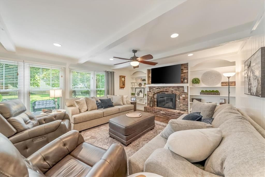 Fireplace and hardwood floors at 10417 OAKMONT Street, Overland Park, KS 66215