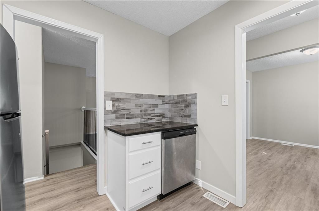 Stainless steel appliances and electric range at 2200 Aqueduct Place, Independence, MO 64057