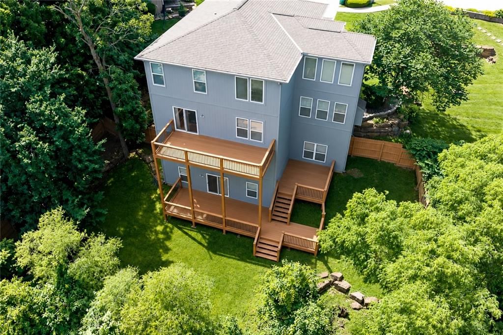 Deck, big backyard and fenced yard at 3858 N 112th Terrace, Kansas City, KS 66109