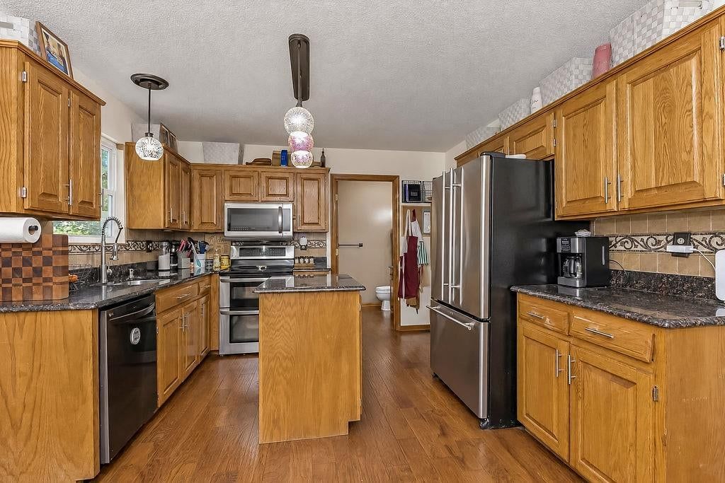 Photo 9 of 37 - 704 Lark Street, Raymore, MO 64083