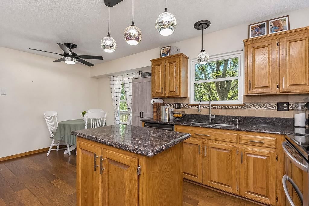 Photo 12 of 37 - 704 Lark Street, Raymore, MO 64083