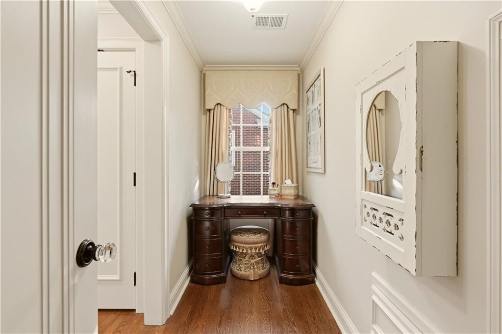 Walk-in shower, tiled shower and double vanity at 1010 W 65th Street, Kansas City, MO 64113