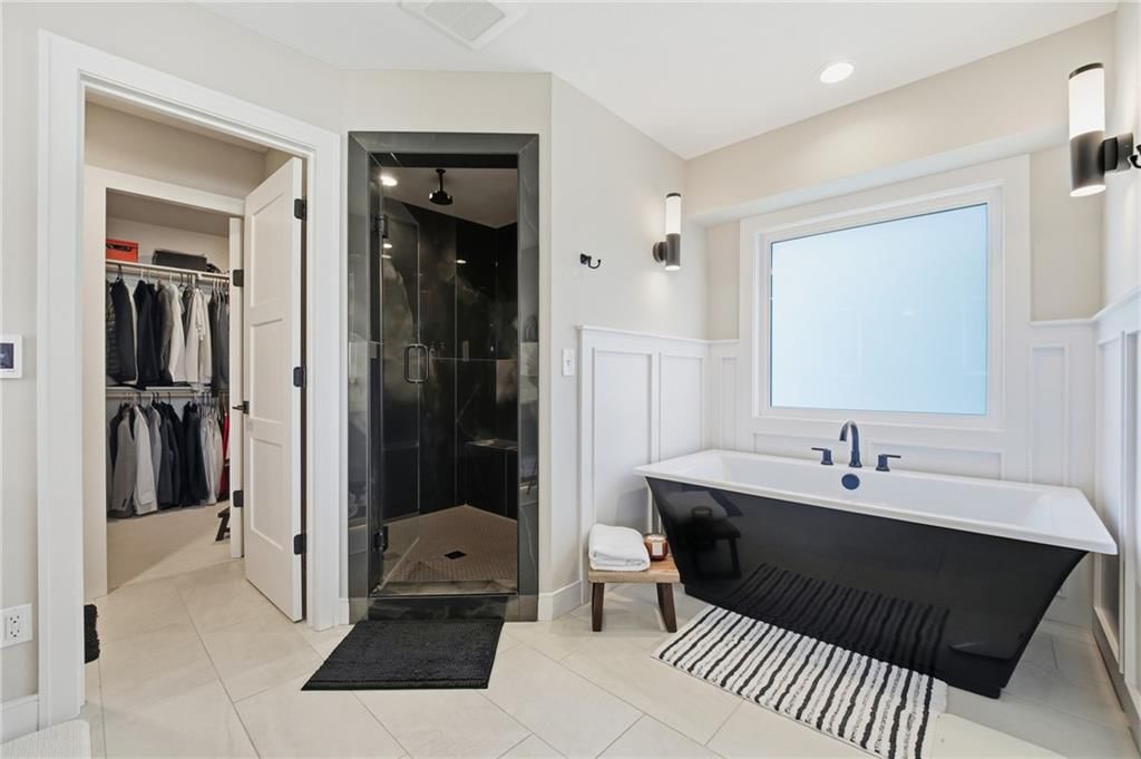 Walk-in shower, tiled shower and frameless glass shower at 3800 W 187th Street, Overland Park, KS 66085