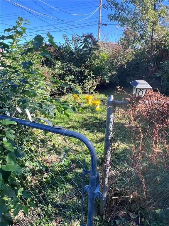 Fenced yard at 5013/5015 N Bellaire Avenue, Kansas City, MO 64119