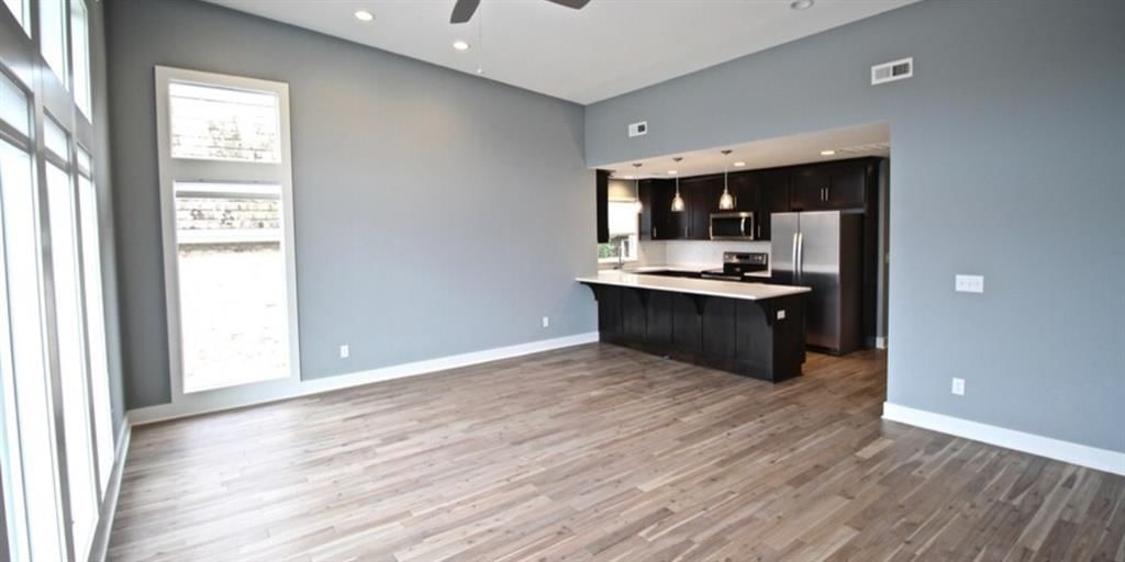 Open floor plan and recessed lighting at 3915 Kenwood Avenue, Kansas City, MO 64110