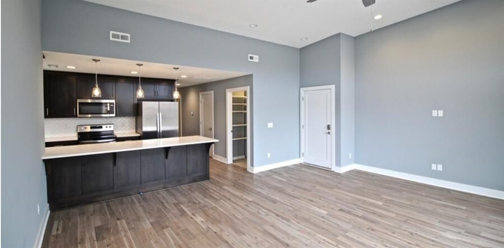 Tall ceilings, floor-to-ceiling windows and wall of windows at 3915 Kenwood Avenue, Kansas City, MO 64110