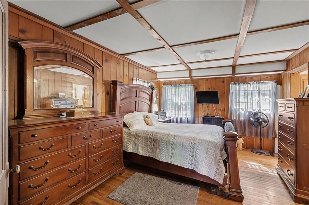Main-floor primary bedroom at 11905 Little Blue Road, Kansas City, MO 64133