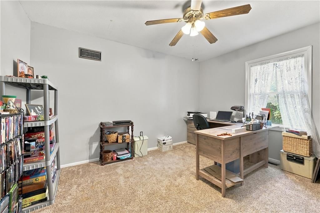 Home office at 1009 E 134th Street, Grandview, MO 64030