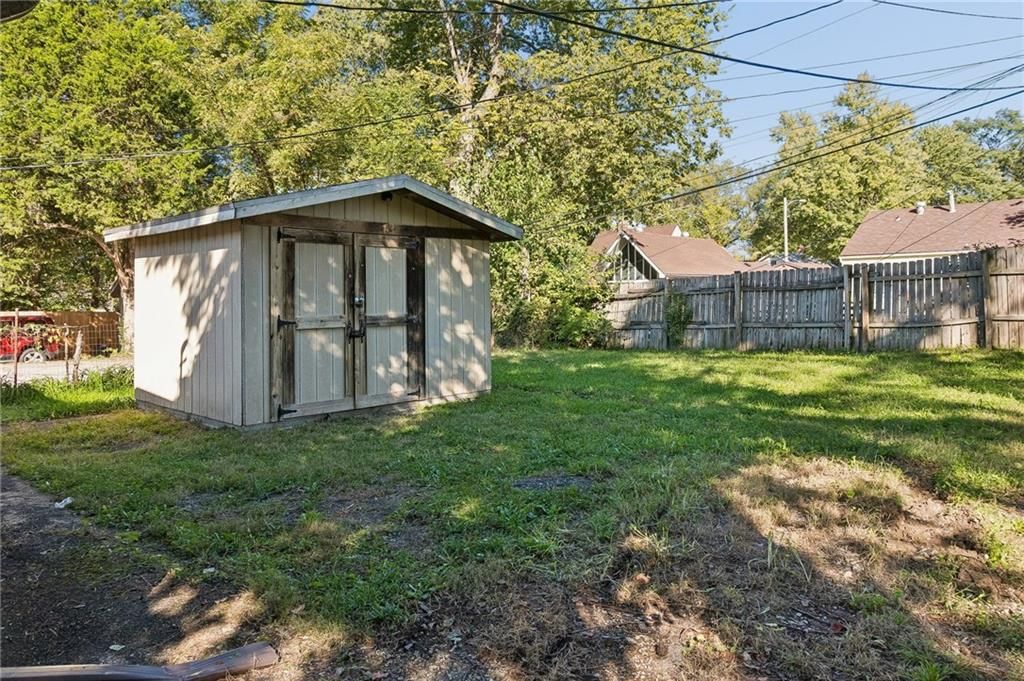 Fenced yard and flat lot at 3002 W 44th Avenue, Kansas City, KS 66103