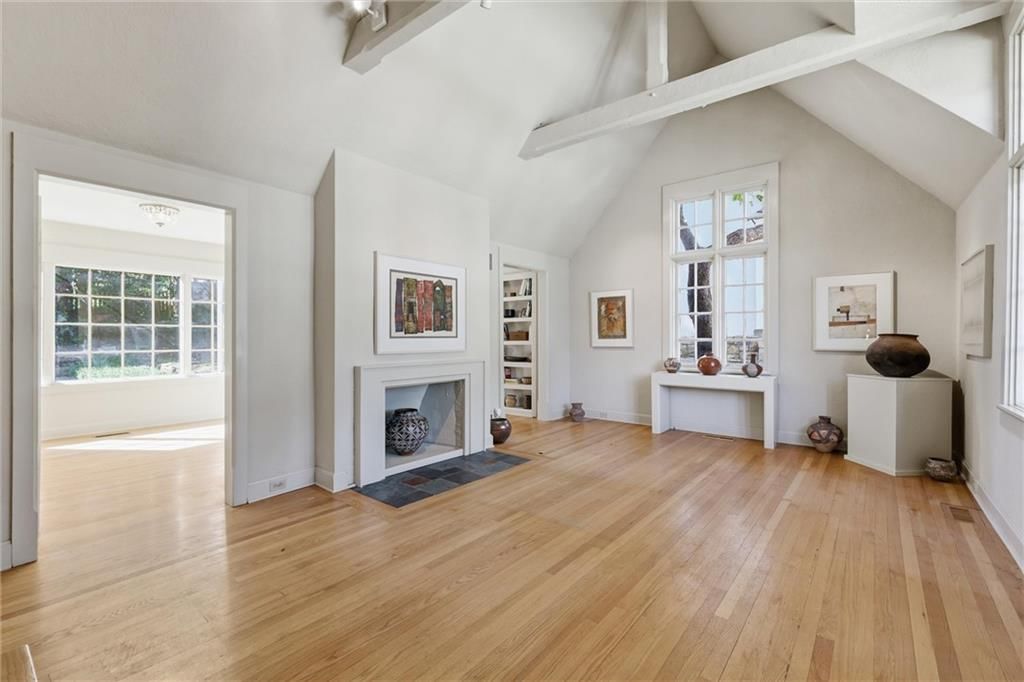 Tall ceilings, fireplace and ceiling beams at 2017 W 50th Street, Westwood Hills, KS 66205