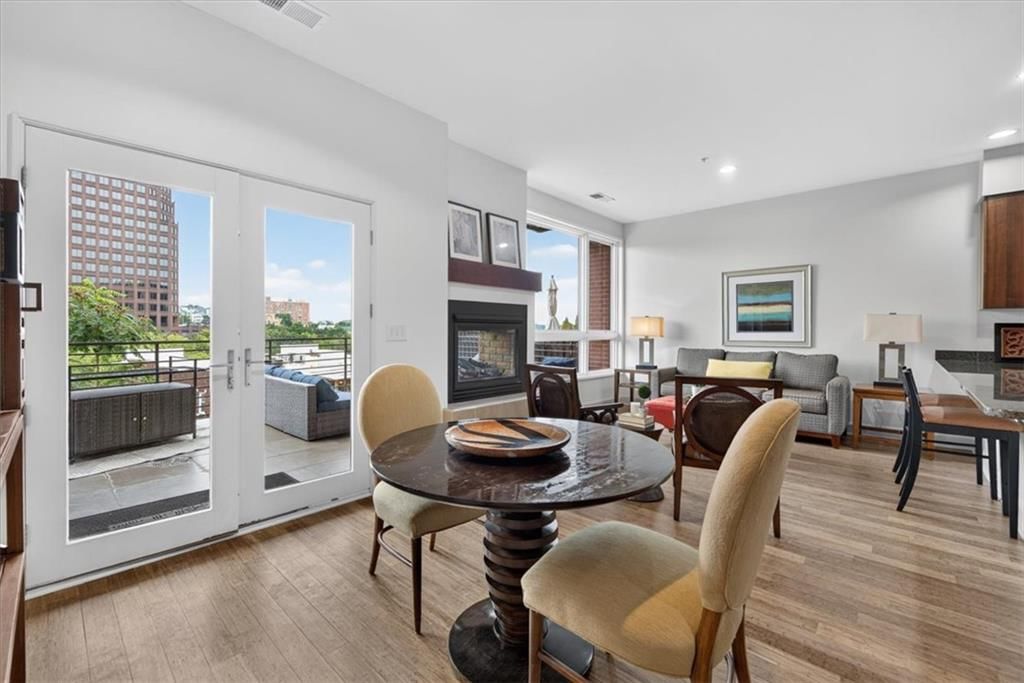 Fireplace and wall of windows at 4521 Wornall Road #106, Kansas City, MO 64111