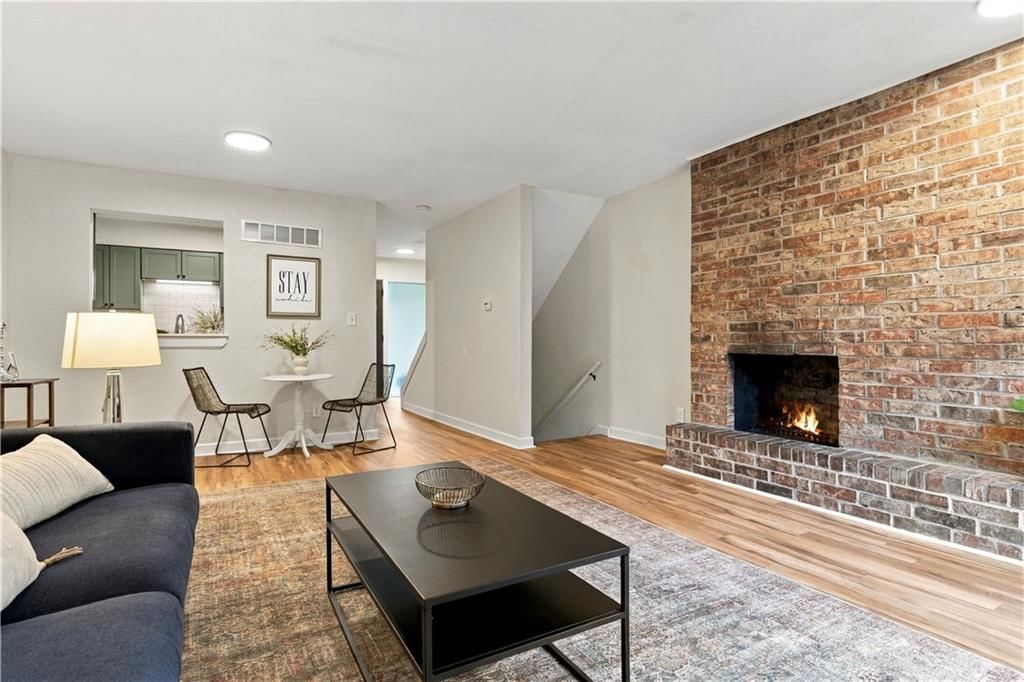 Fireplace and exposed brick wall at 1824 E 97th Street, Kansas City, MO 64131
