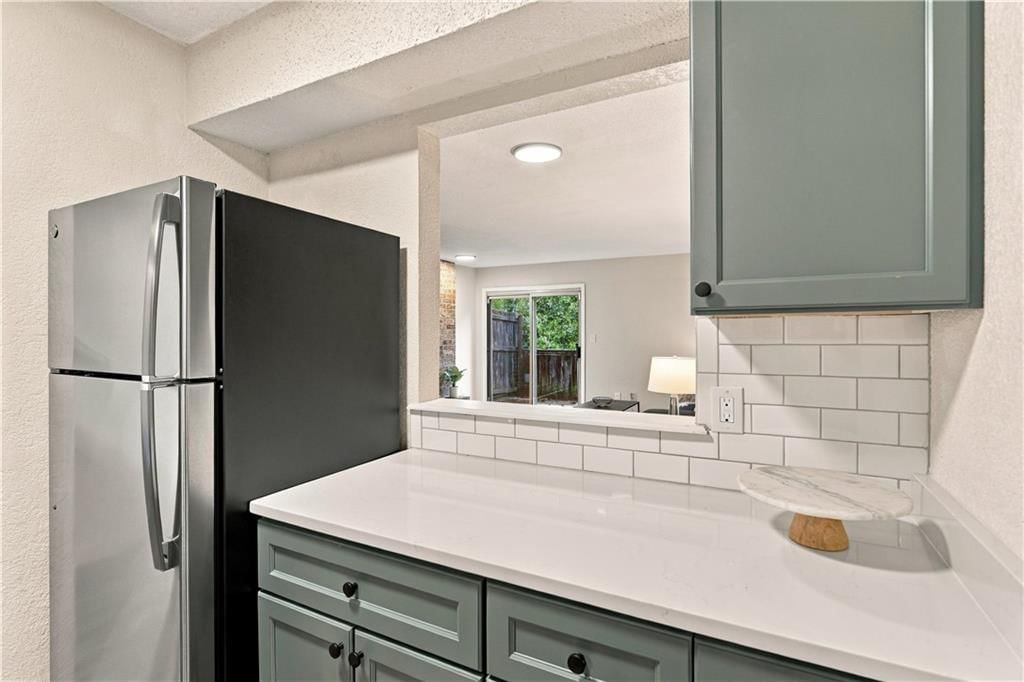 Photo 11 of 26 - 1824 E 97th Street, Kansas City, MO 64131