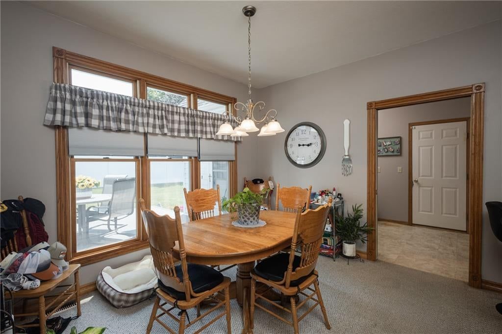 Open floor plan and breakfast nook at 2607 Quail Street, Harrisonville, MO 64701