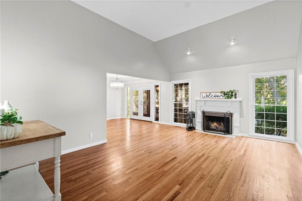 Tall ceilings, fireplace and open floor plan at 11278 Hemlock Street, Overland Park, KS 66210