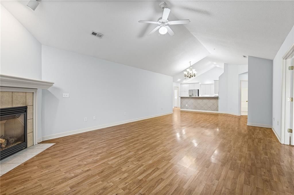 Tall ceilings, fireplace and open floor plan at 7110 Hedge Lane Terrace, Shawnee, KS 66227