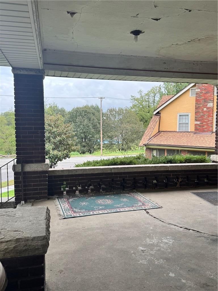Deck and covered patio at 1007 Laurel Avenue, Kansas City, KS 66104