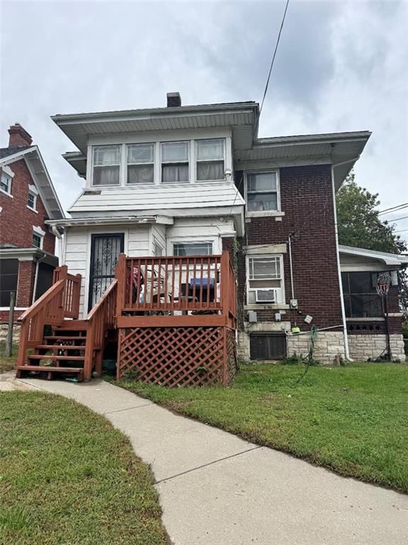 Screened porch and concrete patio at 1007 Laurel Avenue, Kansas City, KS 66104