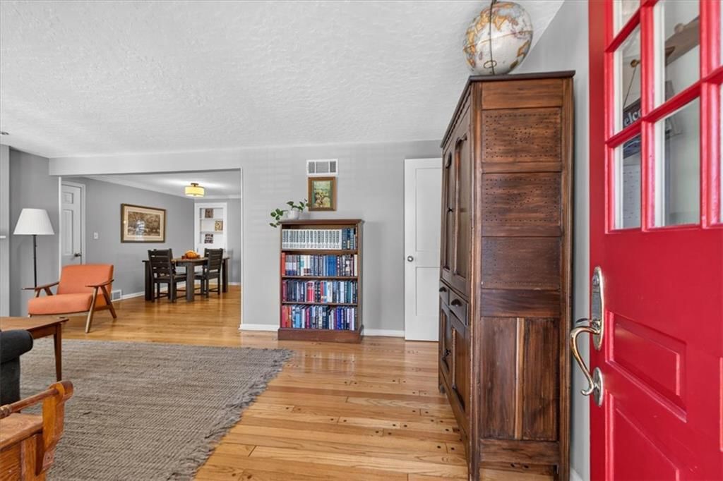 Hardwood floors, white trim and gray walls at 4112 W 69TH Street, Prairie Village, KS 66208