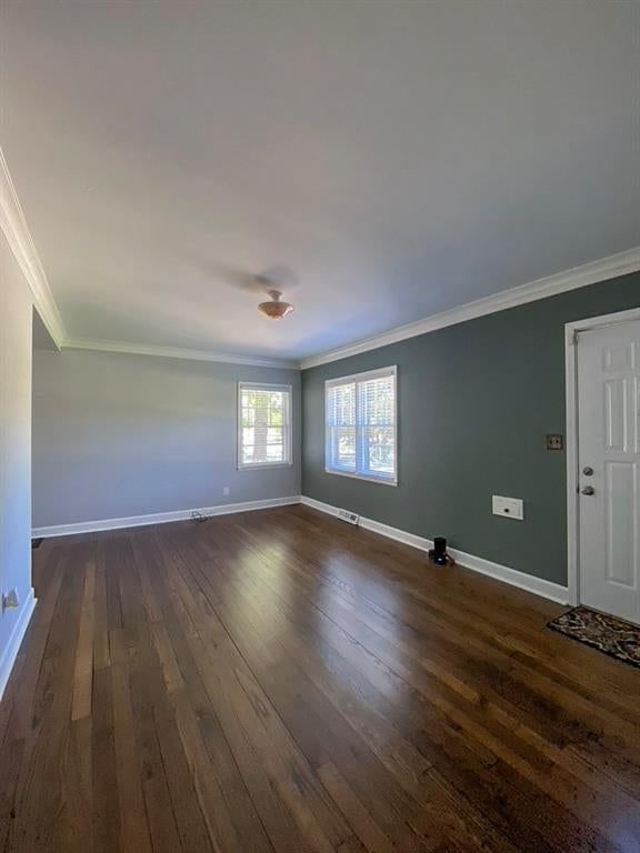 Hardwood floors, white trim and gray walls at 1231 W 79th Street, Kansas City, MO 64114